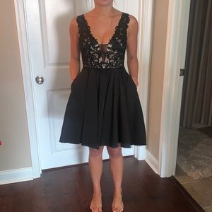 Formal black dress low cut with mesh in front szXS